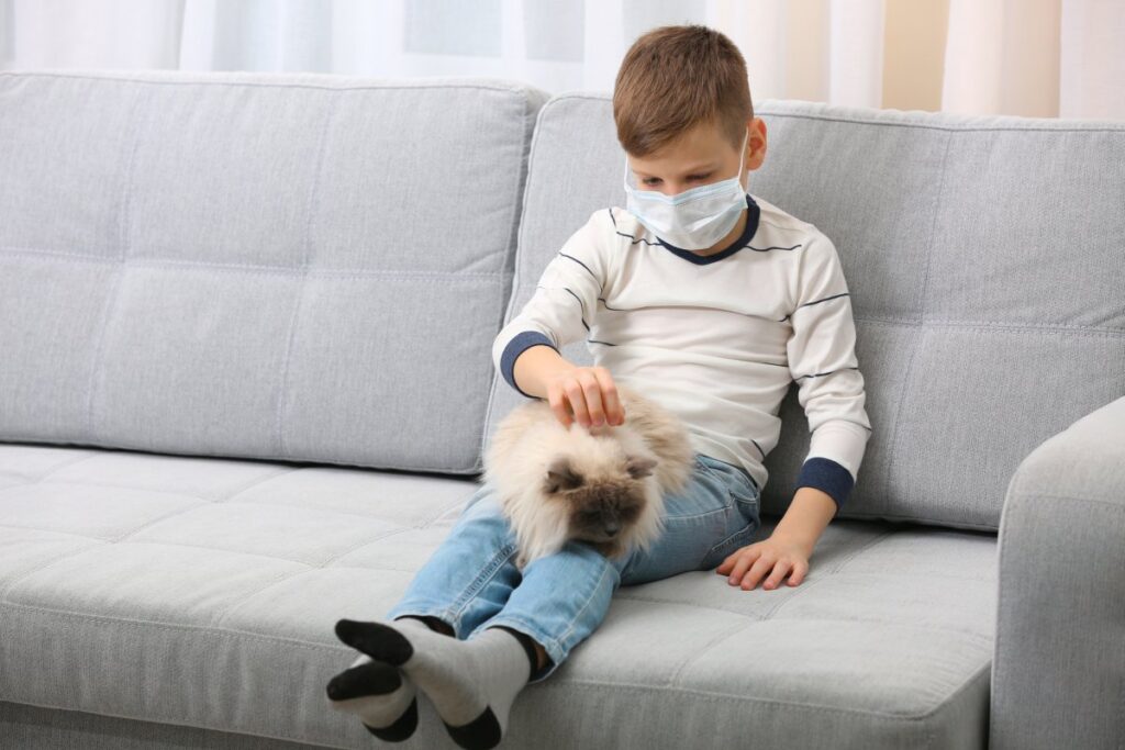 Boy with cat allergy