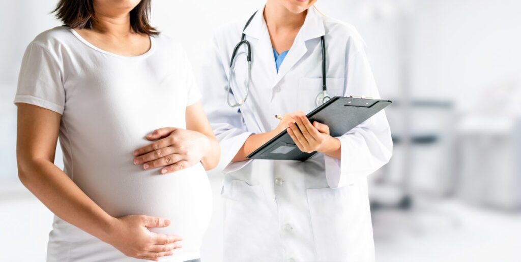 A pregnant woman is consulting to a gynecologist
