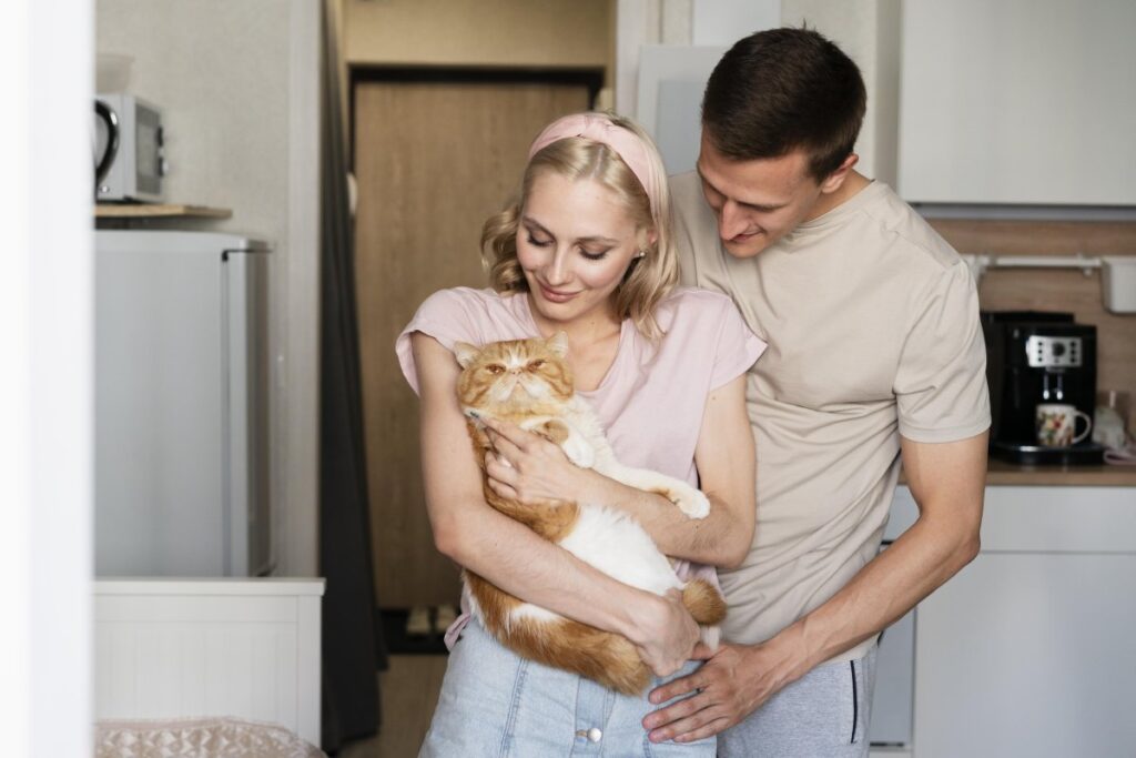 A couple and their cat